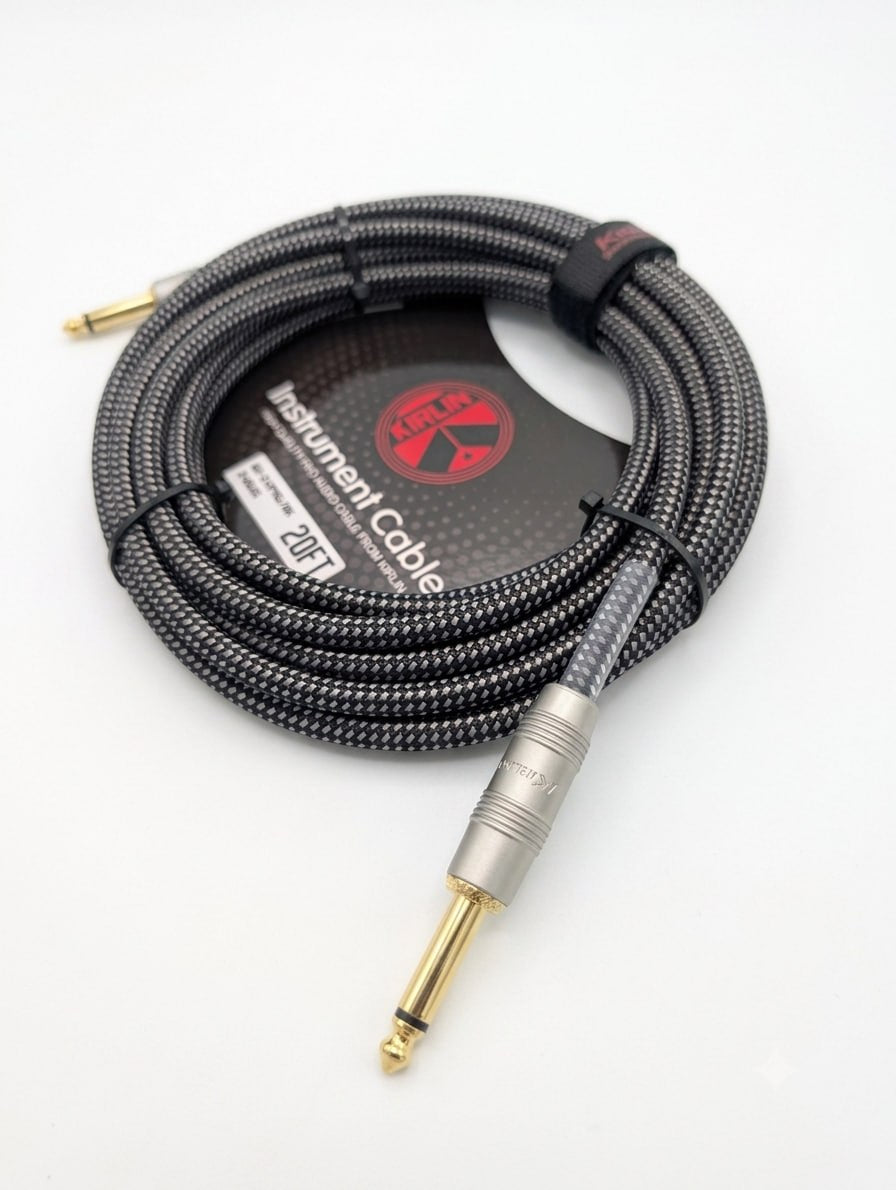 CABLE NEGRO MARCA KIRLIN TEJIDO EN MALLA FLEXIBLE DE 6 METROS PARA INSTRUMENTO, CONECTORES METALICOS DE 1/4